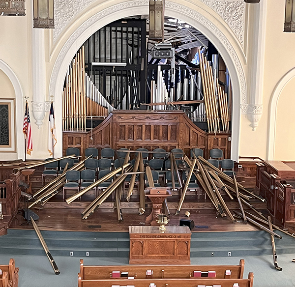 FBC Valdosta sanctuary with ruined pipe organ after collapse of chimney.